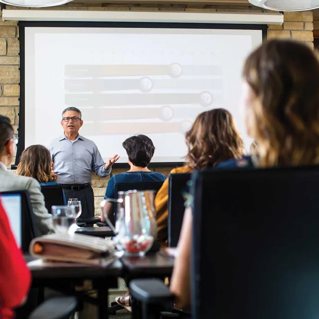 Man presenting at conference