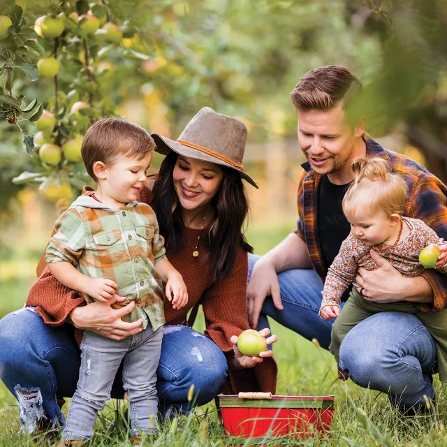 Family Picking Apples