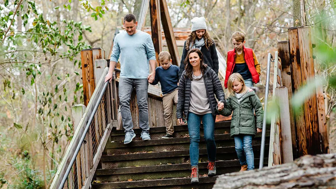 Family walking through Arbor Day farm 