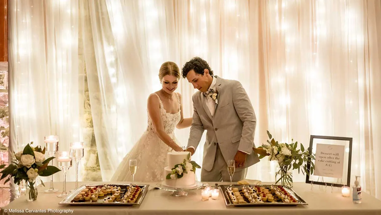 Couple Cutting cake